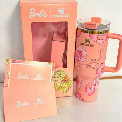 Stanley 40oz insulated tumbler with Barbie floral design, pink background, matching gift box and pink handle