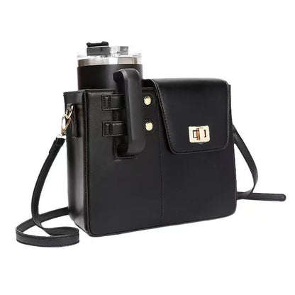 Black crossbody bag with a attached tumbler on a white background