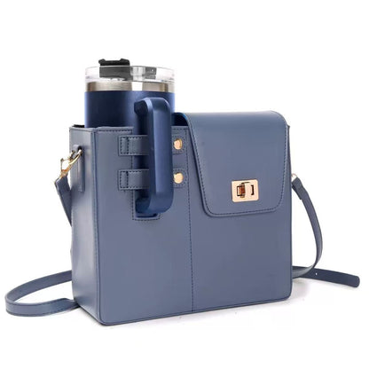 Blue crossbody bag with a attached tumbler on a white background