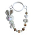 Keychain with a rabbit charm and bead decorations on a white background