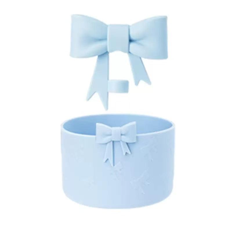 Light blue headband with a bow on a white background