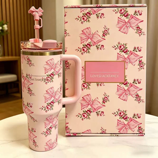 Stanley 40oz insulated tumbler with LoveShackFancy pink bow and floral pattern, matching gift box, pink handle