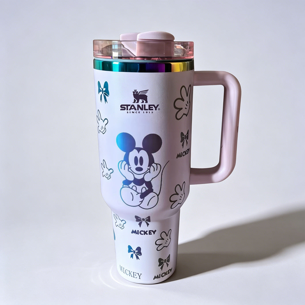 Stanley 40oz insulated tumbler featuring Mickey Mouse illustrations, bows and glove icons