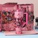 Stanley 40oz insulated tumbler featuring Mickey and Minnie Mouse Mother’s Day artwork, pink background, butterflies, matching gift box and pink handle