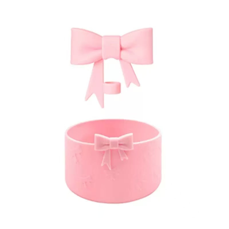 Pink decorative box with a matching bow on a white background