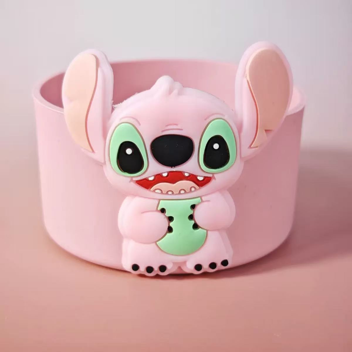 Pink headband with a cartoon character on a light pink background