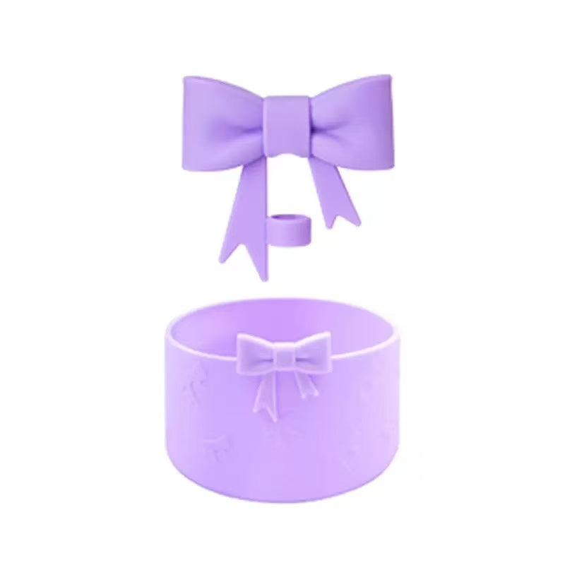 Purple bow-shaped headband on a white background