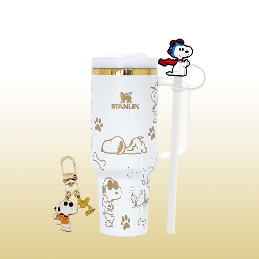 Stanley 40oz insulated tumbler featuring Snoopy dog illustrations, paw prints and bones