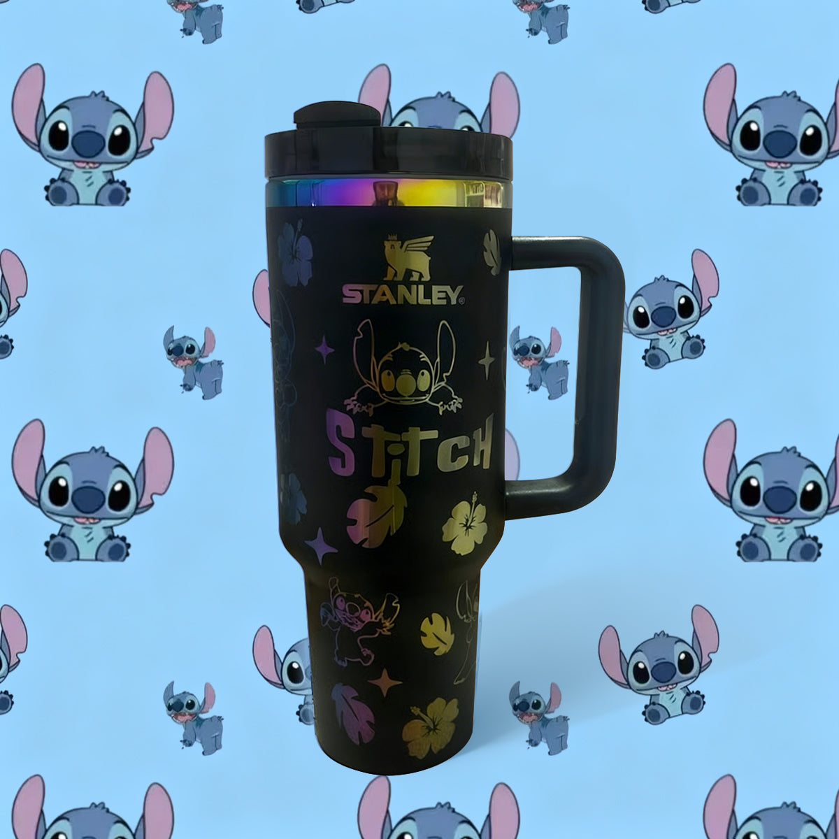 Stanley 40oz insulated tumbler featuring Stitch character illustrations, tropical leaves, and hibiscus flowers, white handle