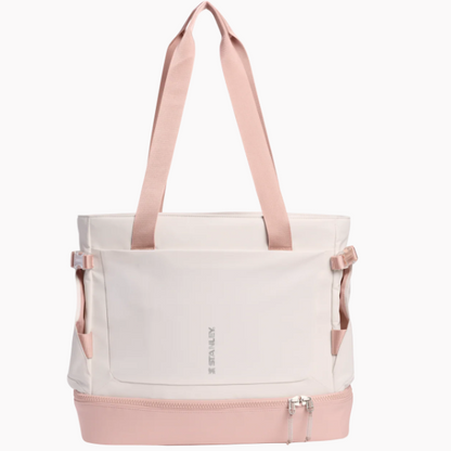 White tote bag with pink accents on a white background