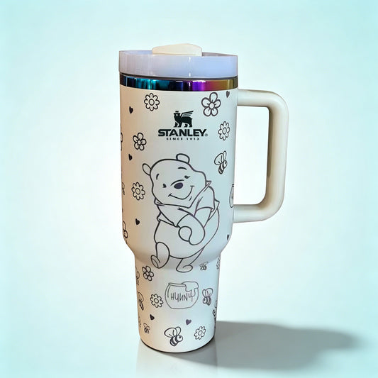 Stanley 40oz insulated tumbler featuring cute white bear illustrations, paw prints and floral accents