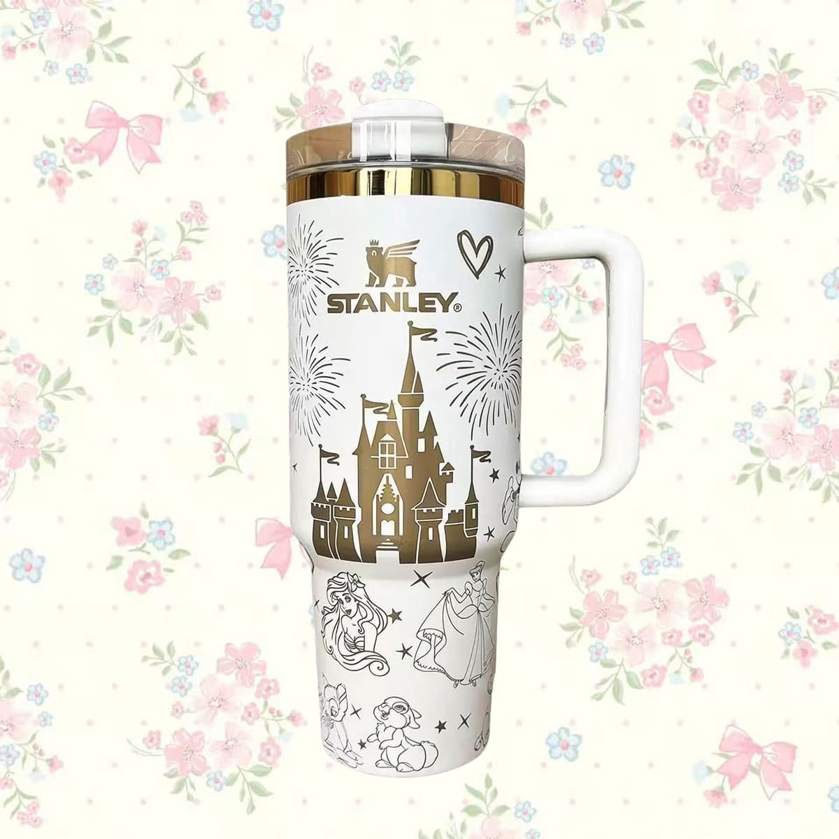 Stanley 40oz insulated tumbler with fairy tale castle and cute animal illustrations, pastel floral background, white ergonomic handle