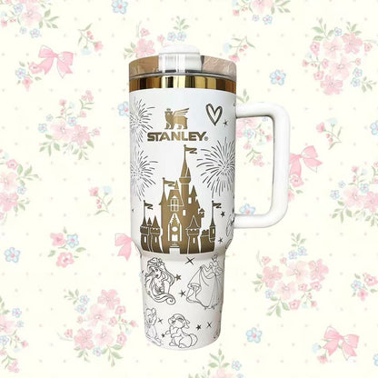 Stanley 40oz insulated tumbler with fairy tale castle and cute animal illustrations, pastel floral background, white ergonomic handle
